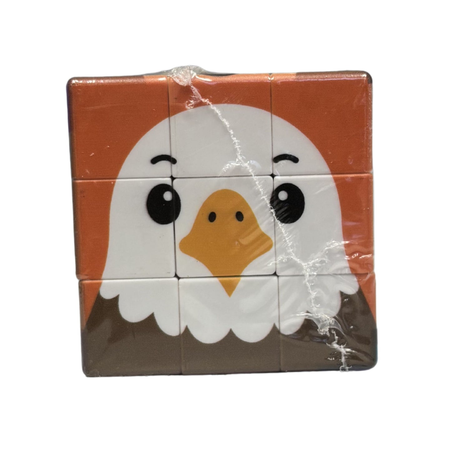 Square puzzle cube with a cartoon eagle design 