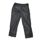 Black rain pants on a white background