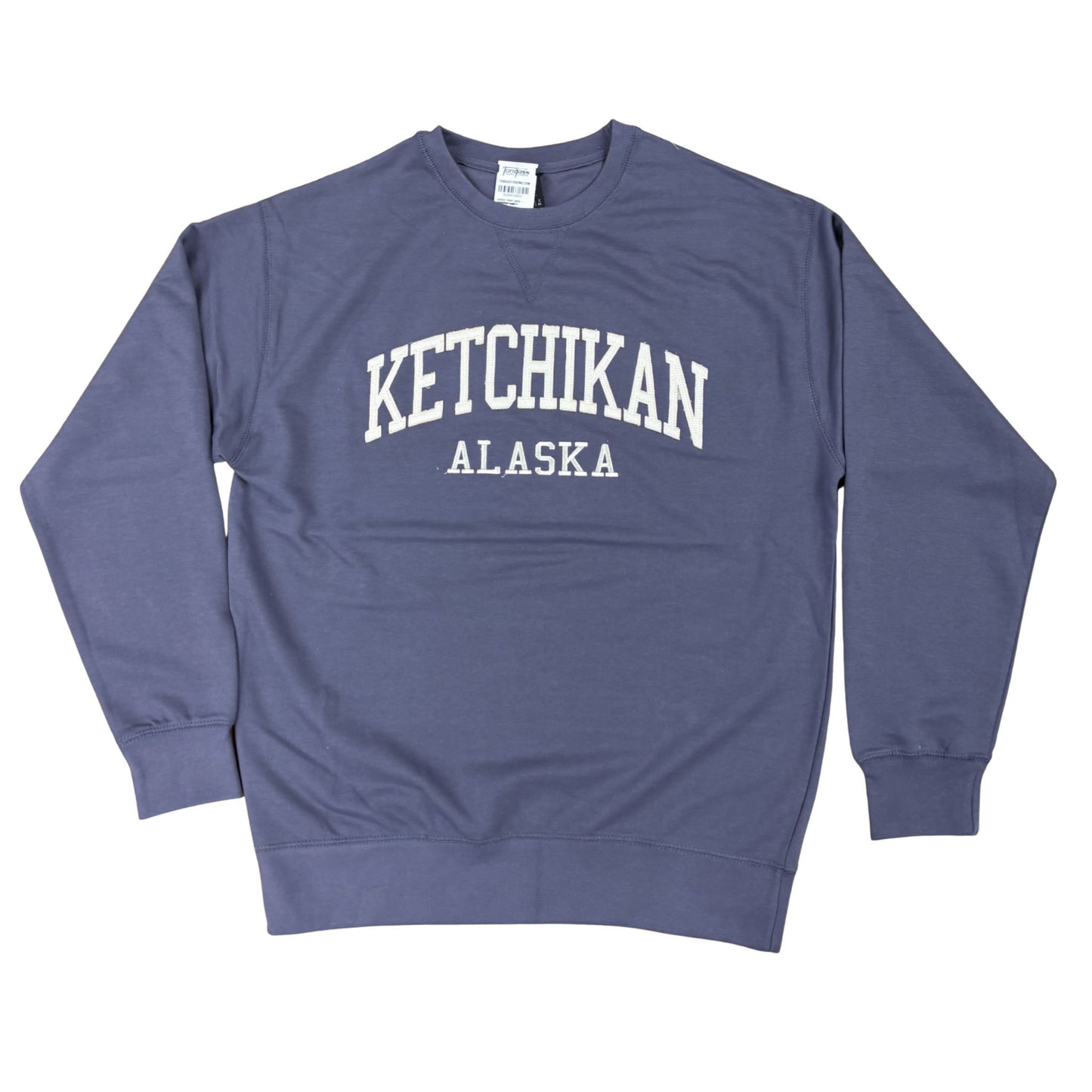 Blue sweatshirt with 'Ketchikan Alaska' text on a white background