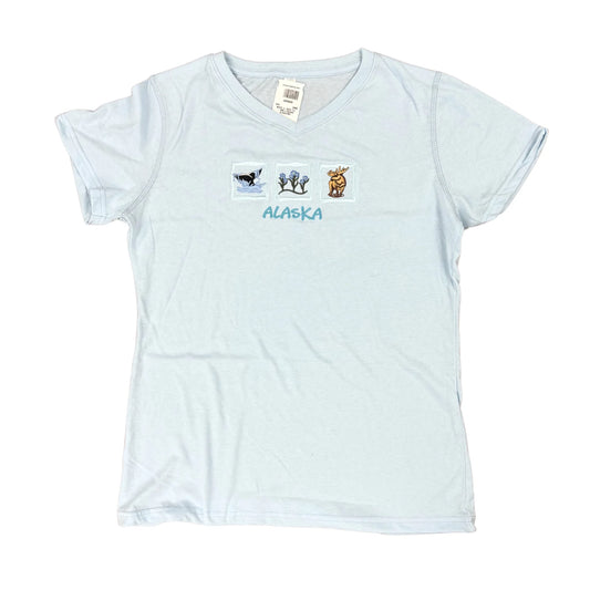 Light blue t-shirt with Alaska-themed design on a white background