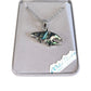 Silver orca pendant necklace in a jewelry box with 'Wild Pearle' branding.