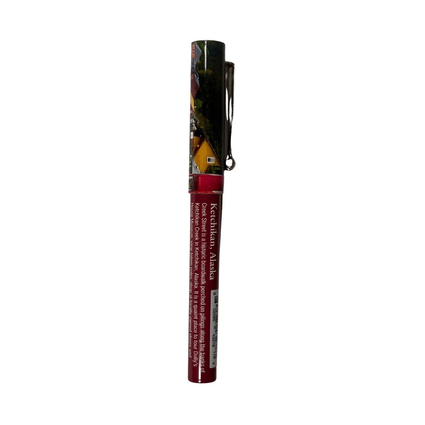 Multicolored pen with a visible brand name on a white background