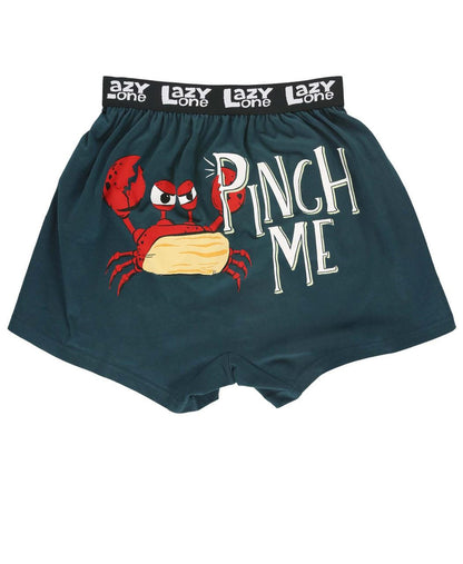 Boxer briefs with a red crab graphic and 'Pinch Me' text on a white background.