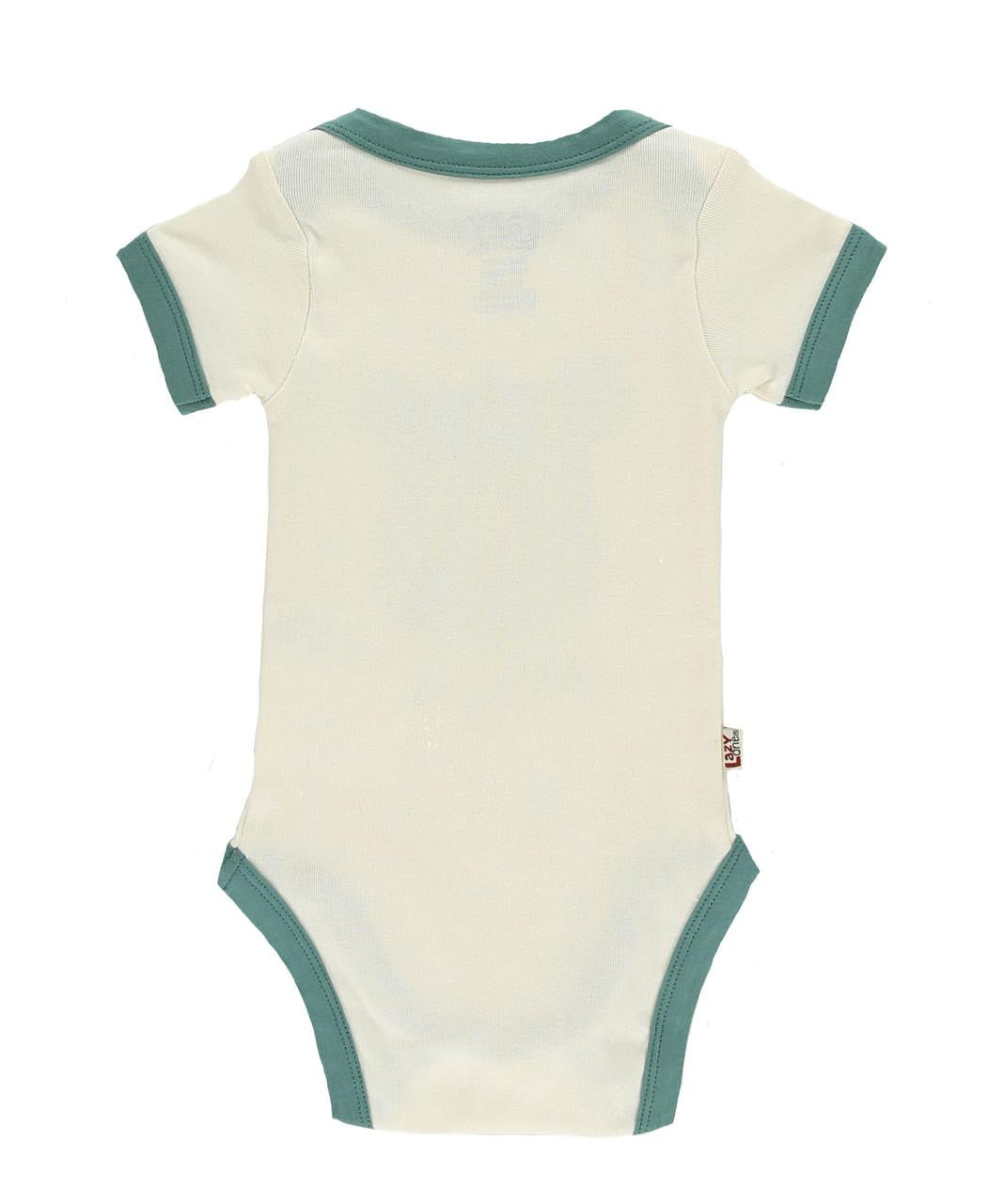 Beige baby onesie with green trim on a white background