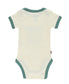 Beige baby onesie with green trim on a white background