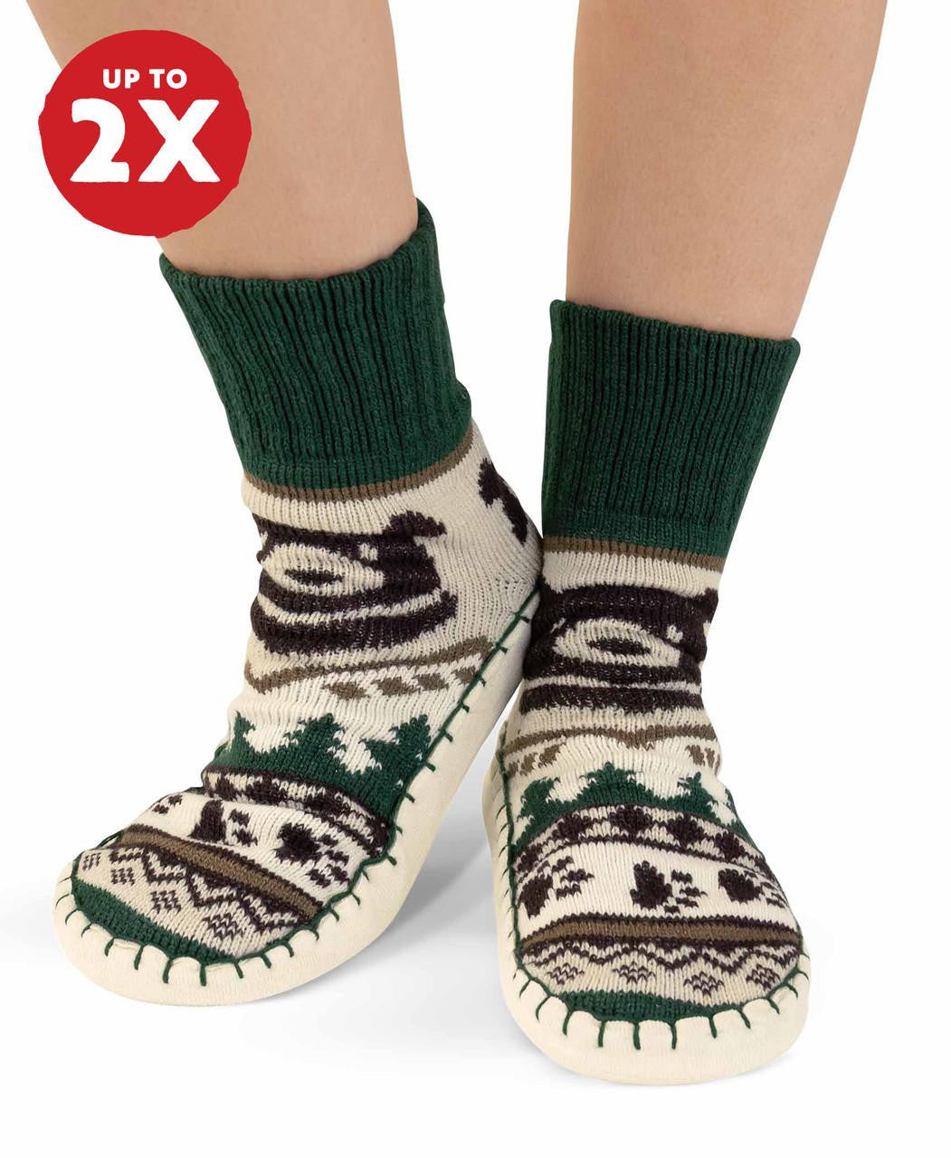 Pair of green and cream patterned mukluks 