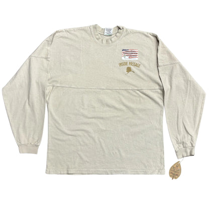 Beige long-sleeve shirt with branding on a white background