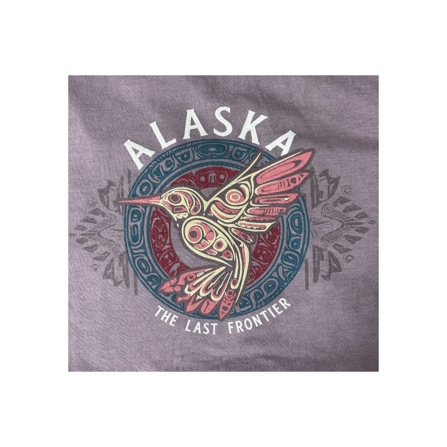 purple t-shirt with a colorful hummingbird design and 'Alaska The Last Frontier' text 