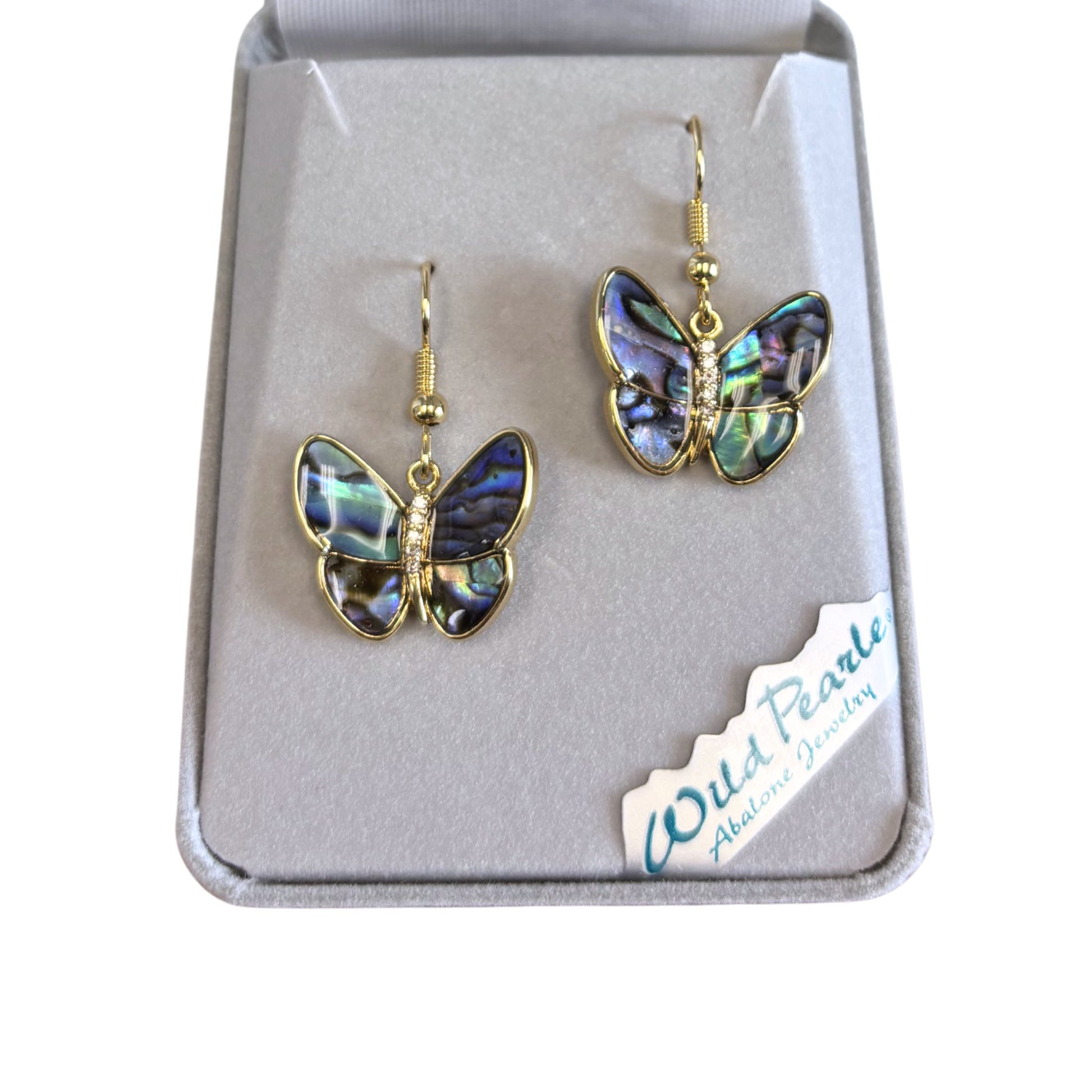 Butterfly-shaped earrings in a box with 'Wild Pearle' branding.