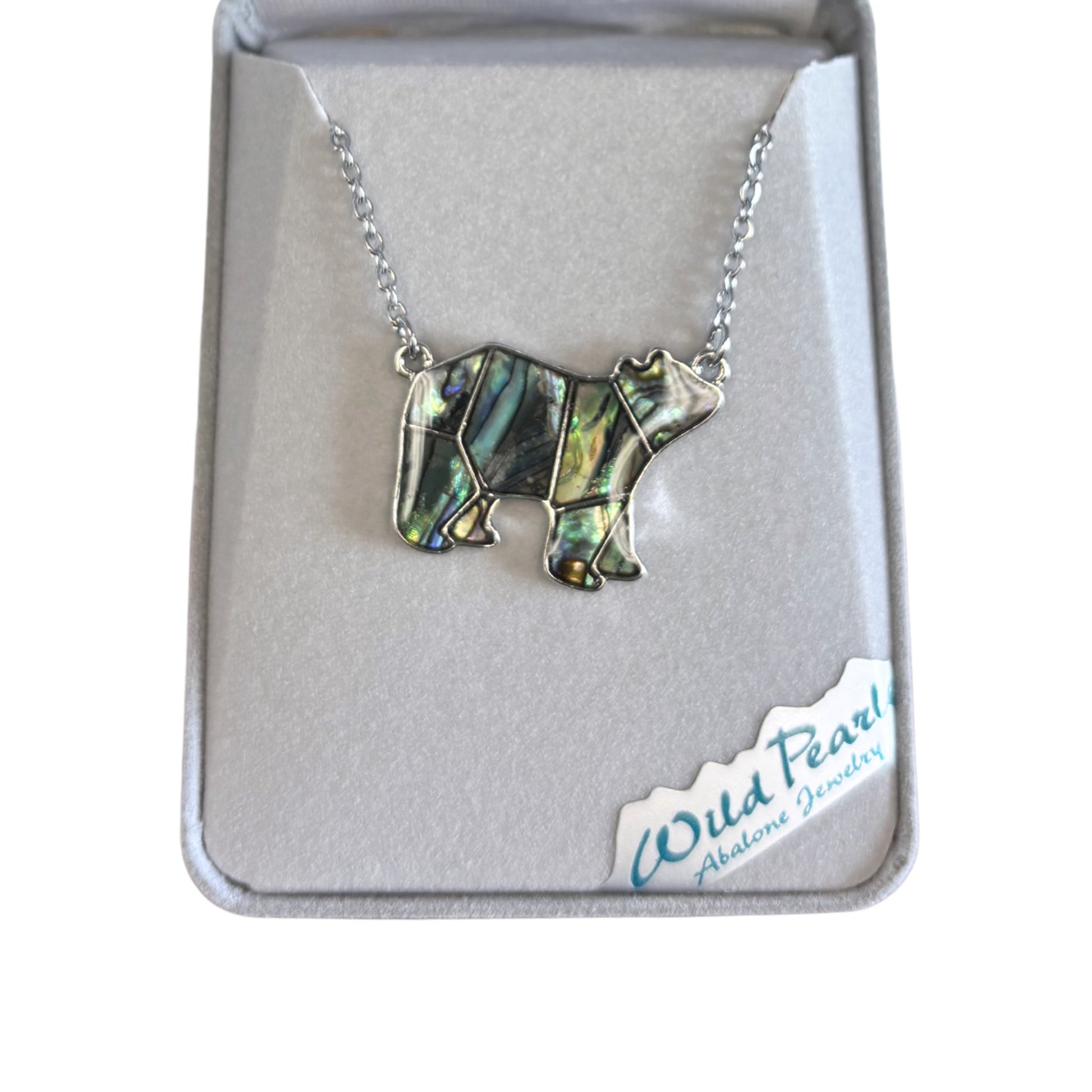 Necklace with bear pendant on a branded card