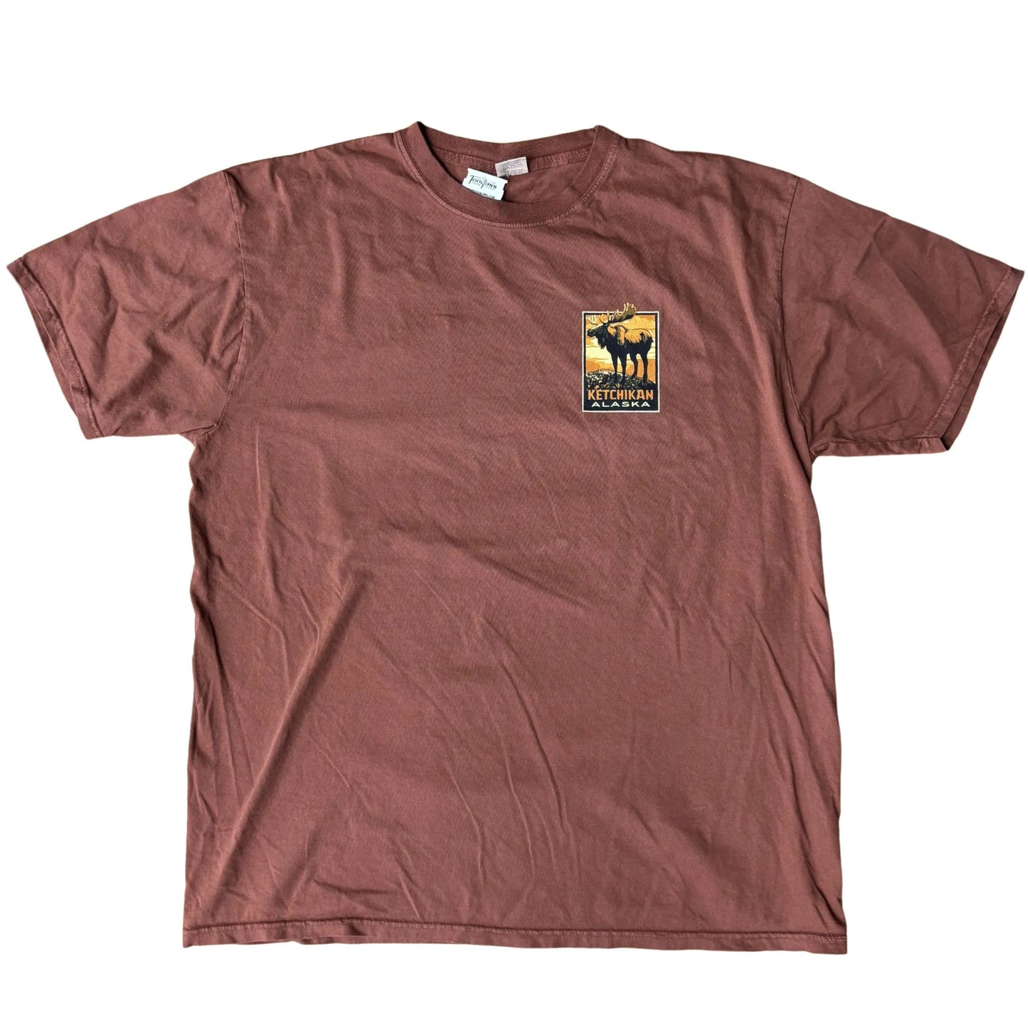 Red t-shirt with a graphic design on a white background