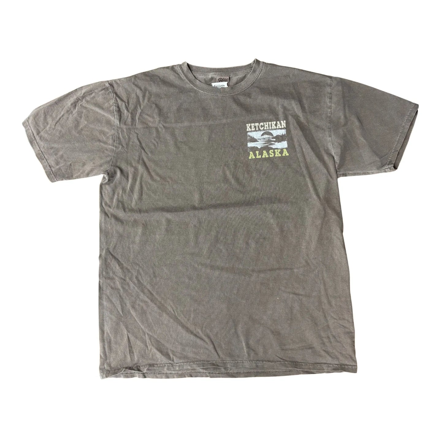 Brown t-shirt with 'Ketchikan Alaska' text and graphic on a white background