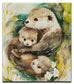 Dishcloth with three otters in a circular arrangement with floral elements