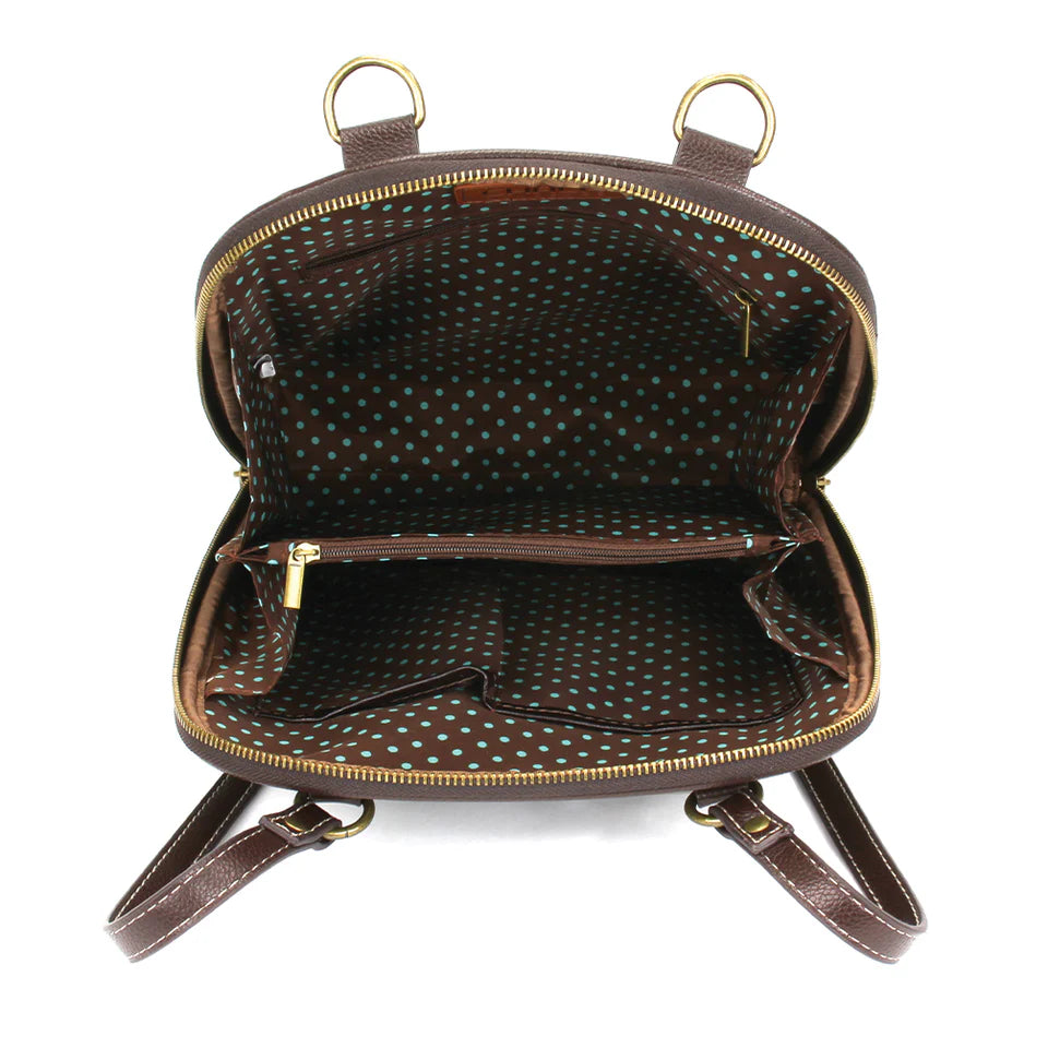 Brown polka dot inside of backpack with gold zippers 