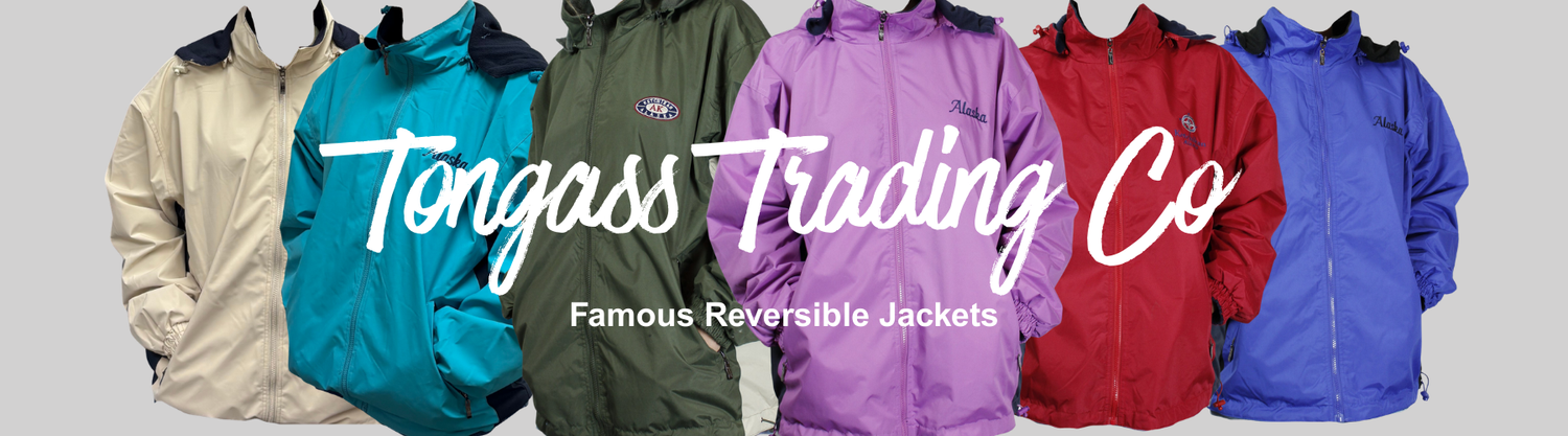 Collection of reversible jackets in various colors with 'Tongass Trading Co' branding.