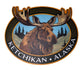 Moose head with antlers and Ketchikan Alaska text on a circular design