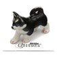 Small black and white husky figurine 