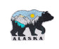 Sticker of a bear with mountains and sun, labeled 'Alaska' 