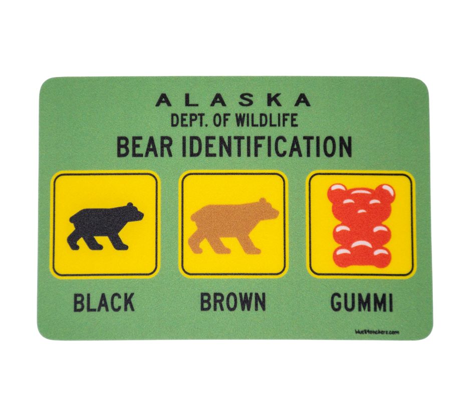 Alaska Department of Wildlife bear identification sticker with black, brown, and gummi bear illustrations on a green background.