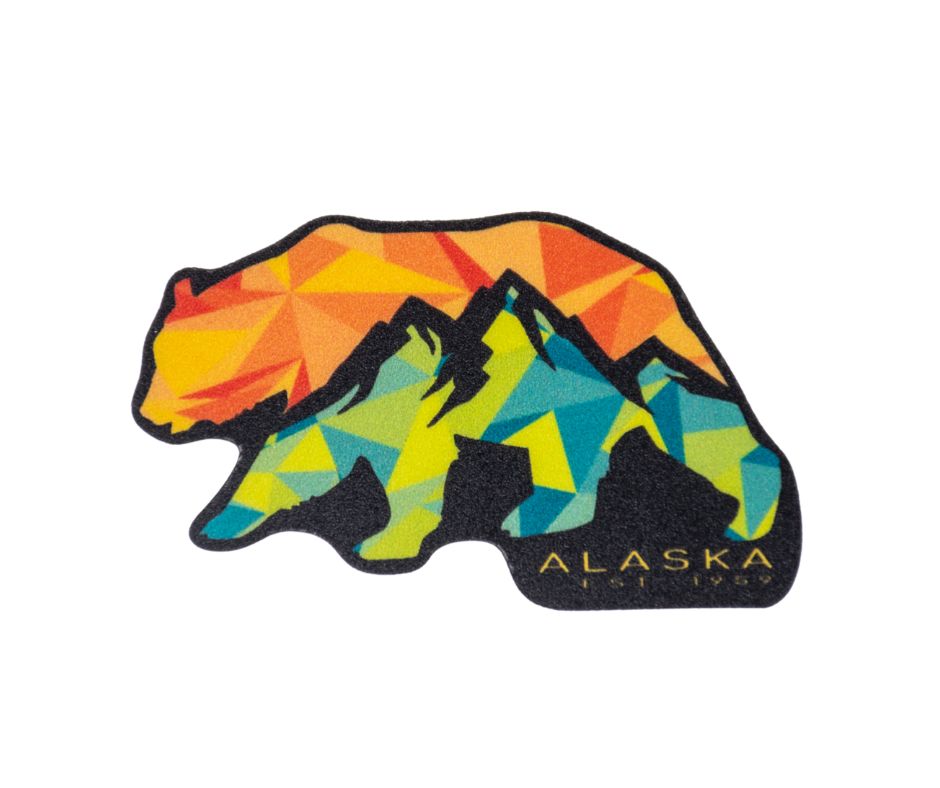 Colorful bear-shaped Alaska sticker with geometric design on a white background
