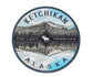 Round sticker with Ketchikan, Alaska text with mountain landscape