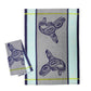 Towel with blue whale design on a gray and light blue striped background