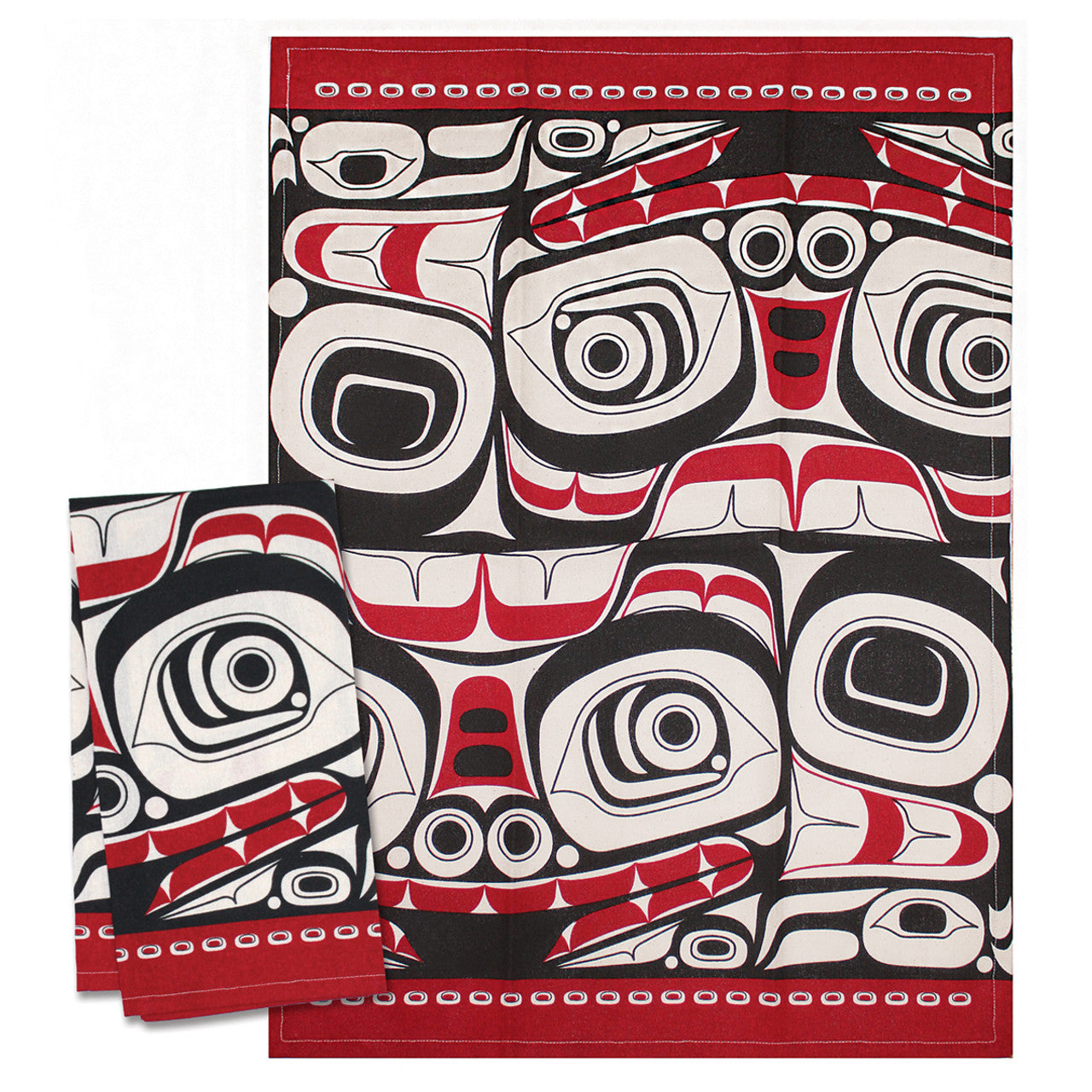 Two red tea towels with black and white formline designs on a white background