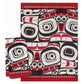 Two red tea towels with black and white formline designs on a white background