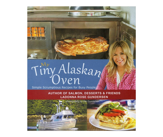 Book Cover of "My Tiny Alaskan Oven" by Ladonna Rose Gunderson featuring a fishing boat, a sandwich and an oven